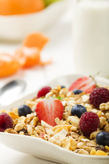 Light, delicious breakfast with cereal and fruit.