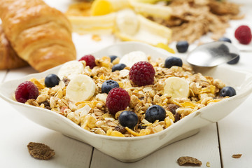Light, delicious breakfast with cereal and fruit.