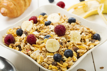 Light, delicious breakfast with cereal and fruit.