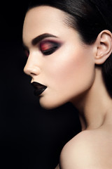 Obraz premium Beauty Fashion Model Girl with Black Make up. Dark Lipstick.