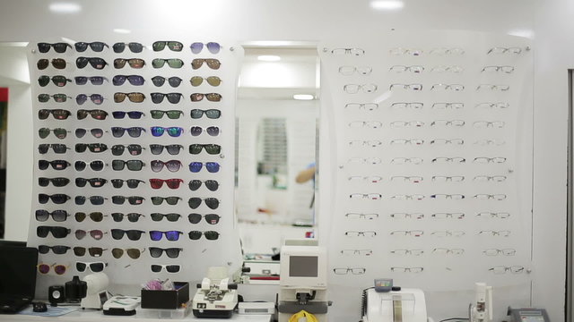 Glasses shown on a wall at the optical shop