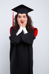 Studio portrait picture from a young graduation woman