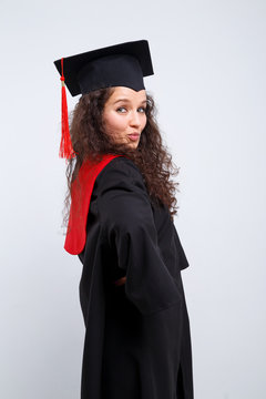 Studio portrait picture from a young graduation woman