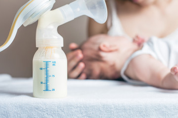 Manual breast pump, mothers breast milk is the most healthy food for newborn baby. Happy mother...