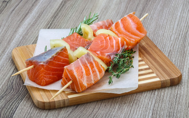 Raw salmon skewers