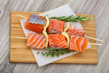 Raw salmon skewers
