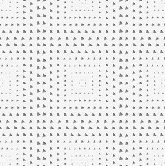 Perforated paper with squares textured with triangles