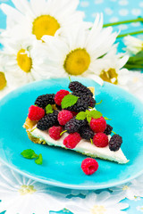 slice of a tart with fresh berries.
