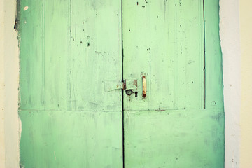 The old retro vintage green/turquoise door