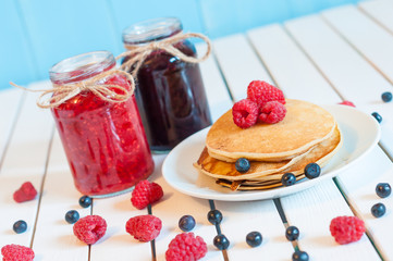 Stack of wheat golden pancakes or pancake cake with freshly