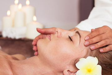 Obraz na płótnie Canvas Face Massage. Close-up of a beautiful Woman Getting Spa Treatmen