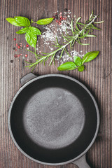 Scattered herbs and salt