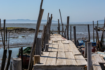 Fototapeta premium Very Old Dilapidated Pier in Fisherman Village