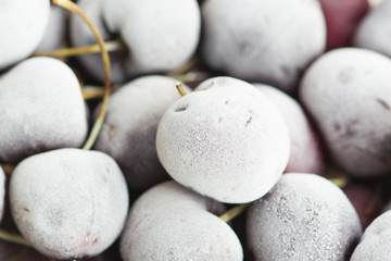 frozen cherry berries  on the wooden table