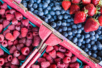 Raspberry, blueberry and strawberry on a farmers market