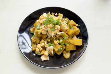 Fried pumpkin with egg