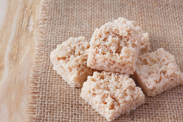 Coconut candy cocada on sackcloth
