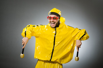 Man wearing yellow suit with mic