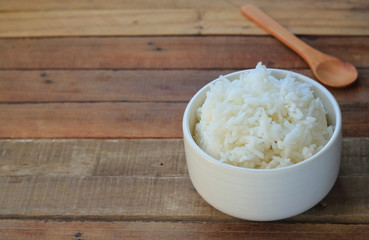 Thailand rice in a bowl placed on a wooden floor