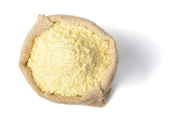 uncooked corn flour on white, tilt shift lens