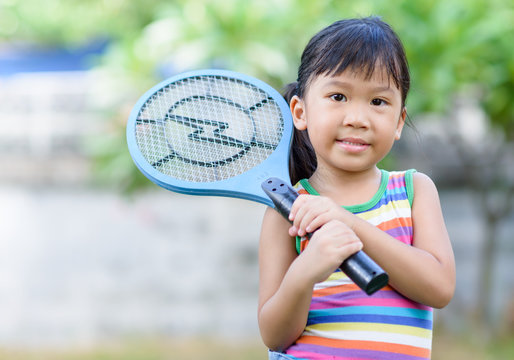 Cute Asian Holds Electronic Mosquito Trap