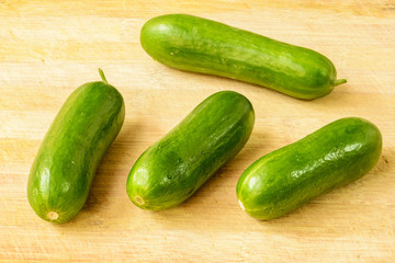 cucumbers on the wooden board
