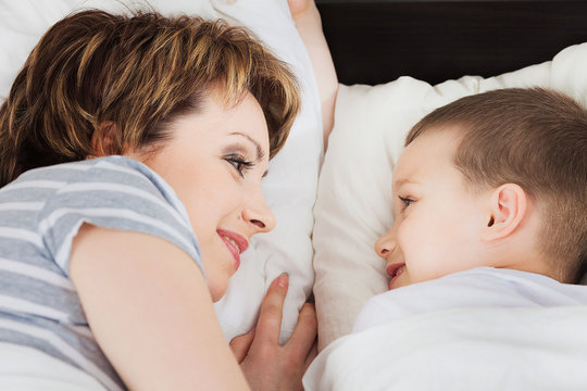 Happy woman looking at her son