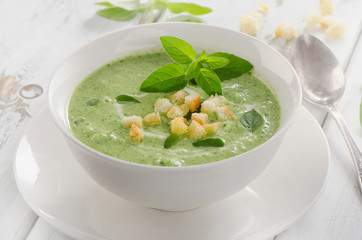 Creamy vegetable soup with croutons.