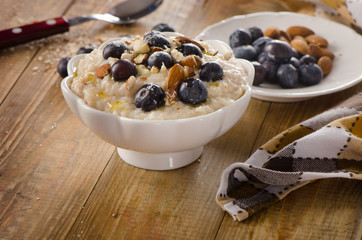 Oatmeal with blueberries and nuts  for  Breakfast.