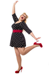 Excited woman posing in one leg