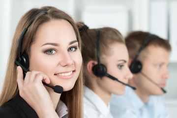 Smiling customer support operator at work