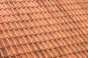 Old red roof tiles closeup