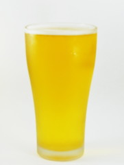 blurry glass of beer when drink for a pine