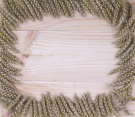 Wooden frame background ears of wheat