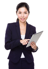 Young Businesswoman use of the tablet pc