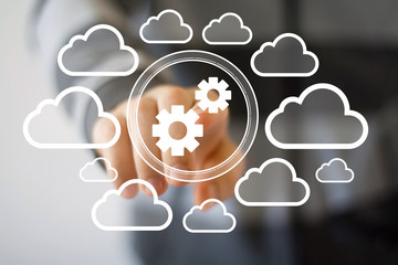 Businessman push button engineering connection network cloud