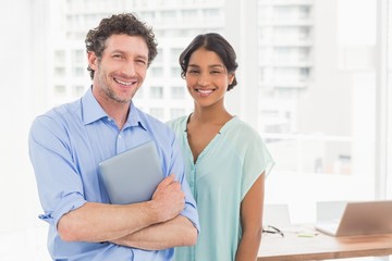  Casual business partners looking at tablet