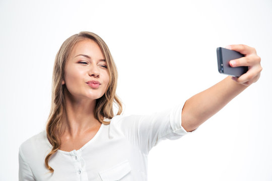 Happy woman making selfie photo