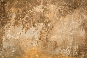 Grunge aged empty street wall of the old house with cracks, plaster falling off