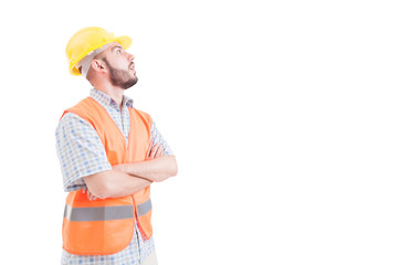 Surprised builder or engineer looking up