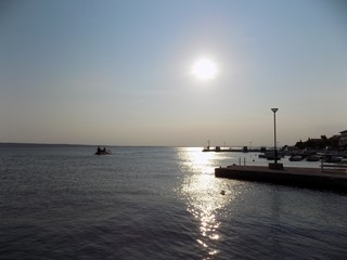 Port, sea and sunny sky