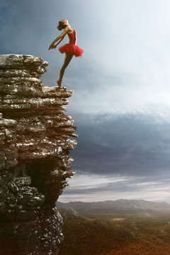 Ballet Dancer balances on a rock