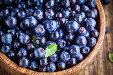 Fresh organic blueberries in a bowl closeup