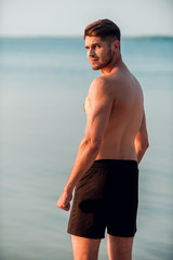 Feeling confident about his shape. 