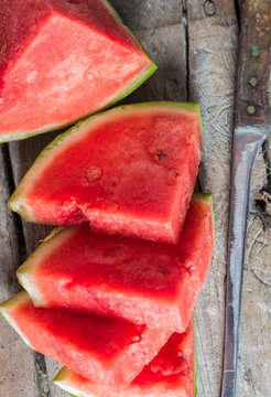 Pieces of watermelon on a wooden table