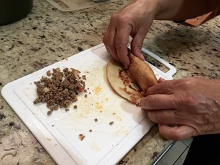 Mother making pancakes