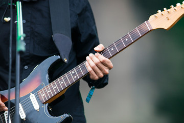 Obraz na płótnie Canvas Guitarist on stage