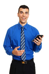 Surprised young businessman in blue shirt with calculator in hand