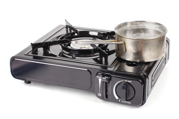 Portable gas stove with pot isolated on white background