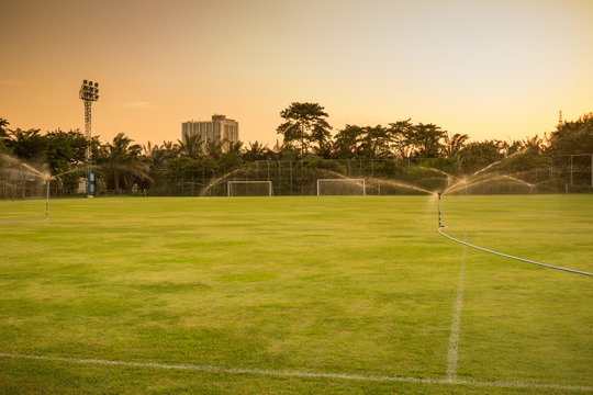 Water sprikling in soccer field